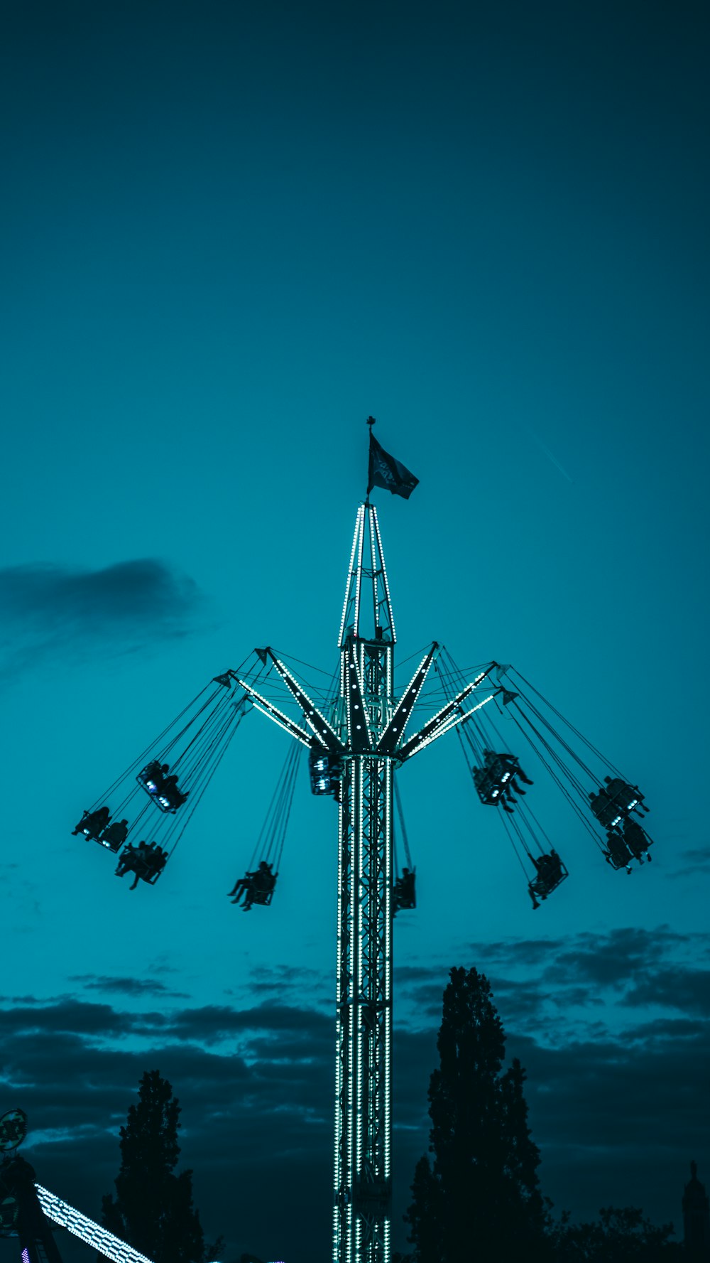 a group of people riding a roller coaster