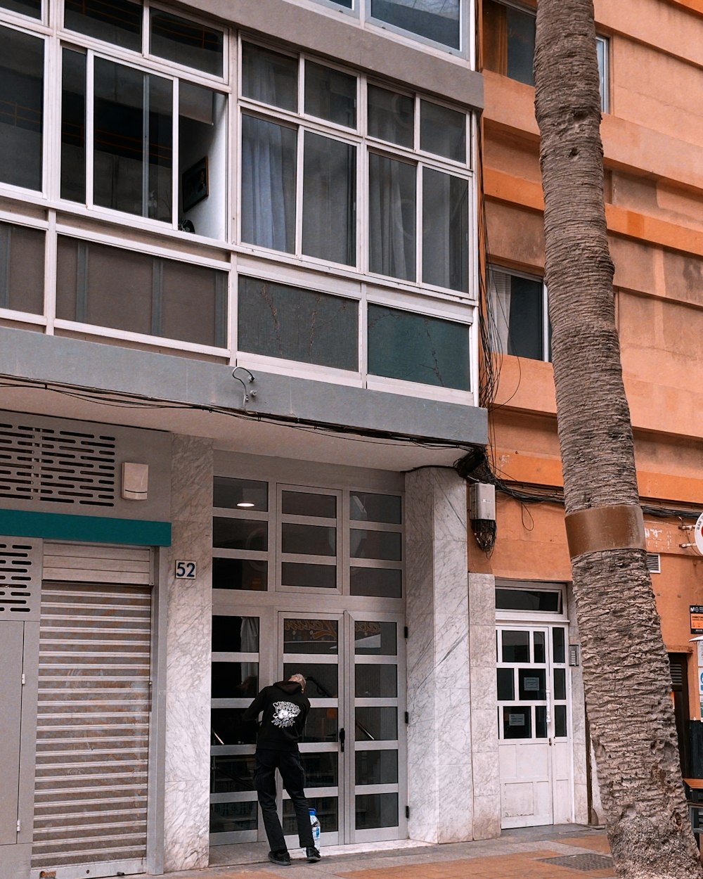 a person walking out of a building