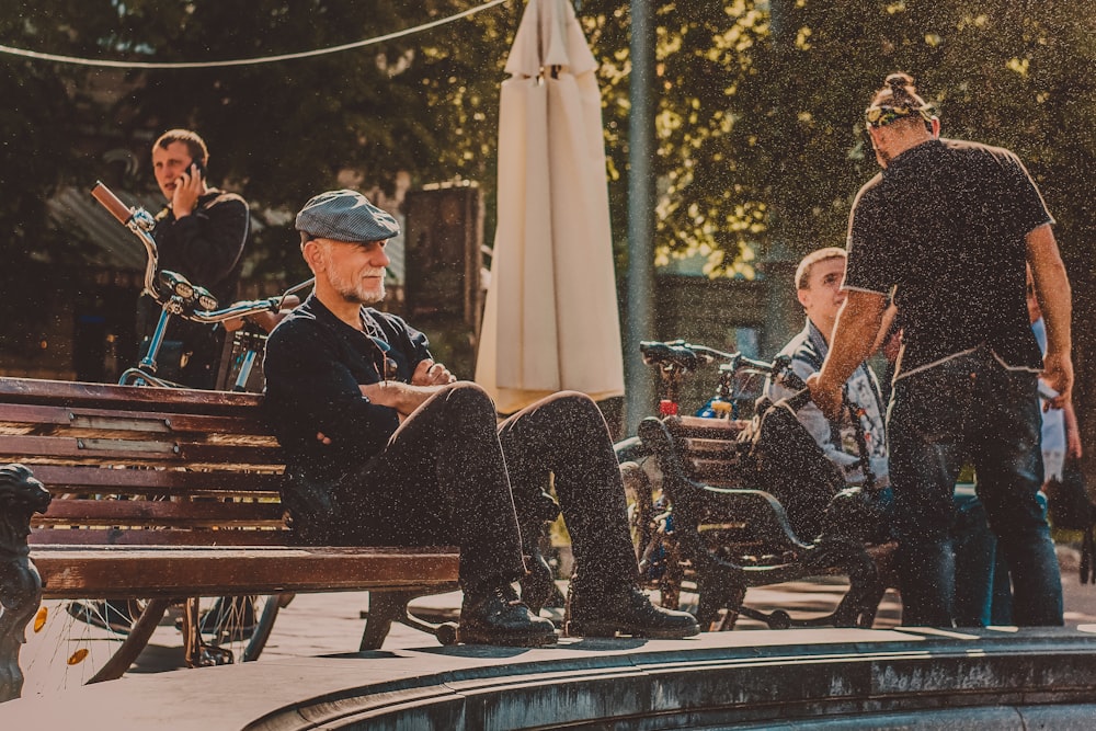 a group of people sitting on a bench