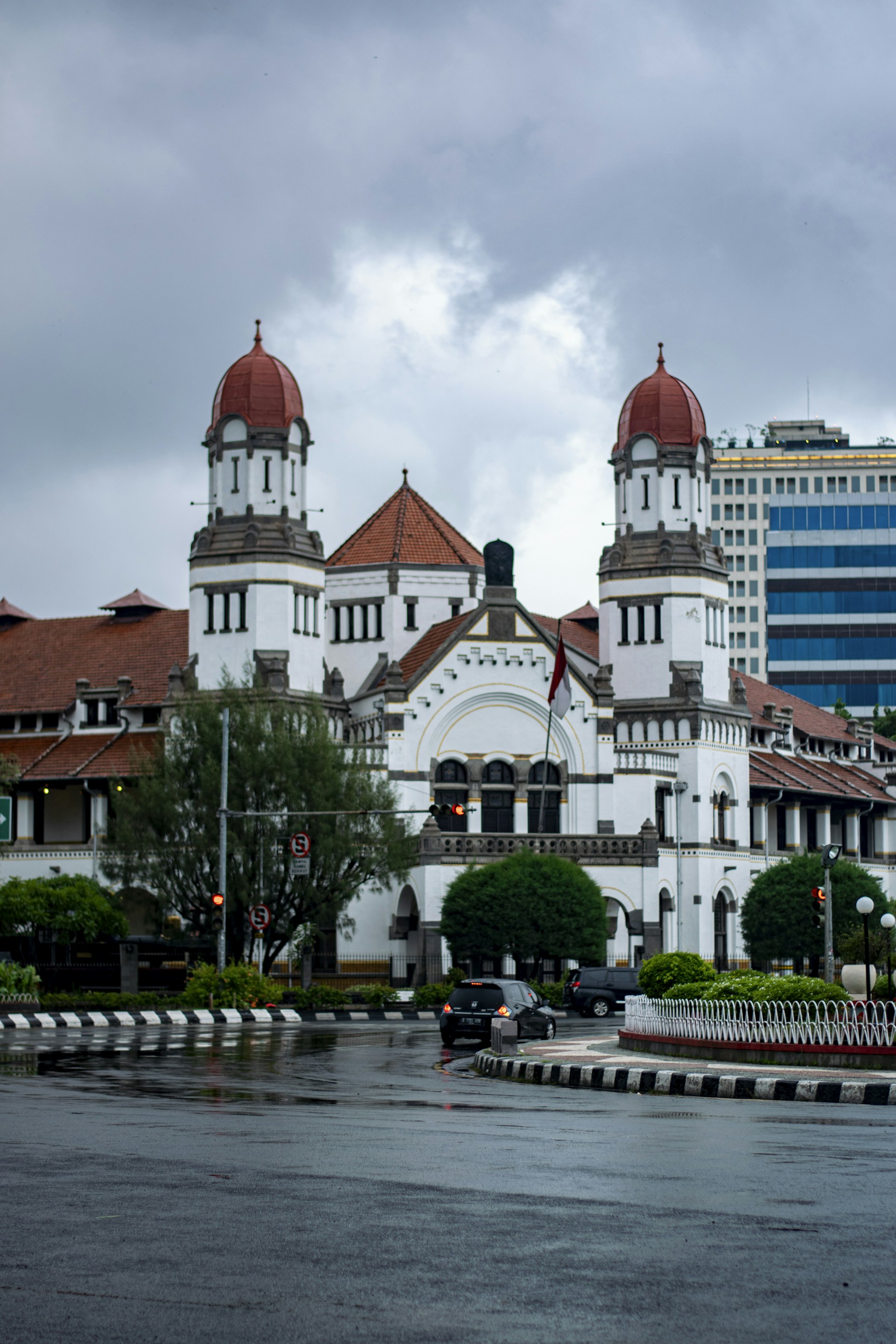 a large white building with red roofs
