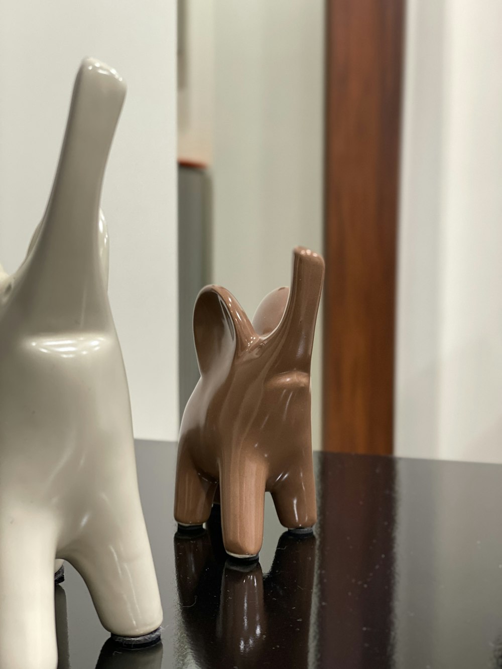 a pair of wooden hand statues