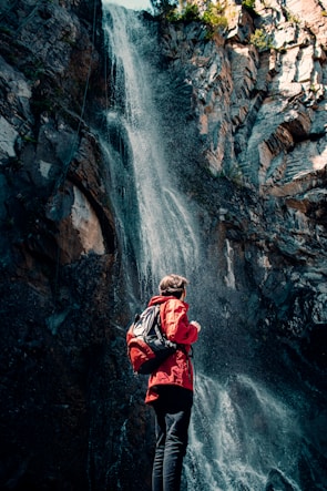 a person standing on a cliff