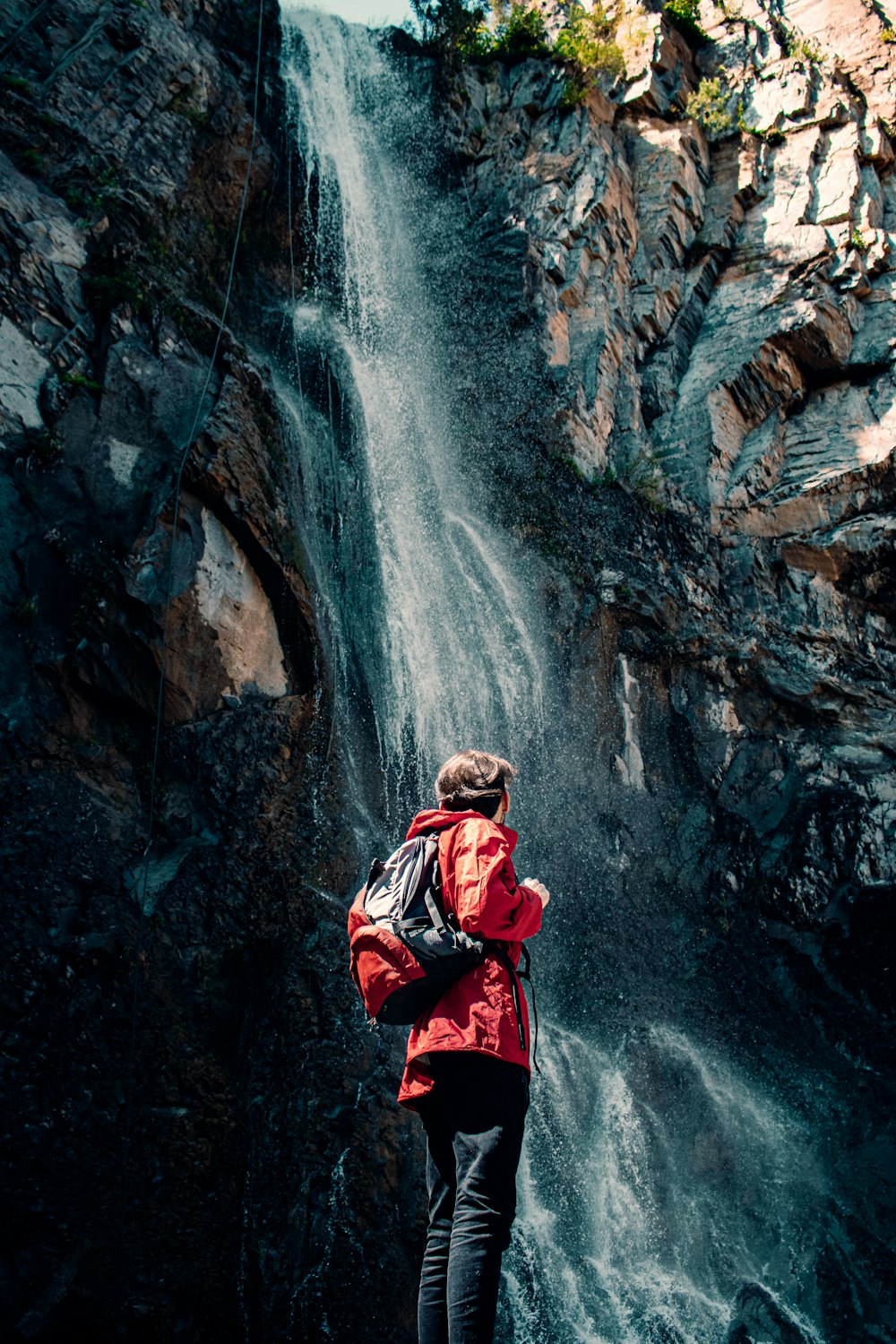 a person standing on a cliff