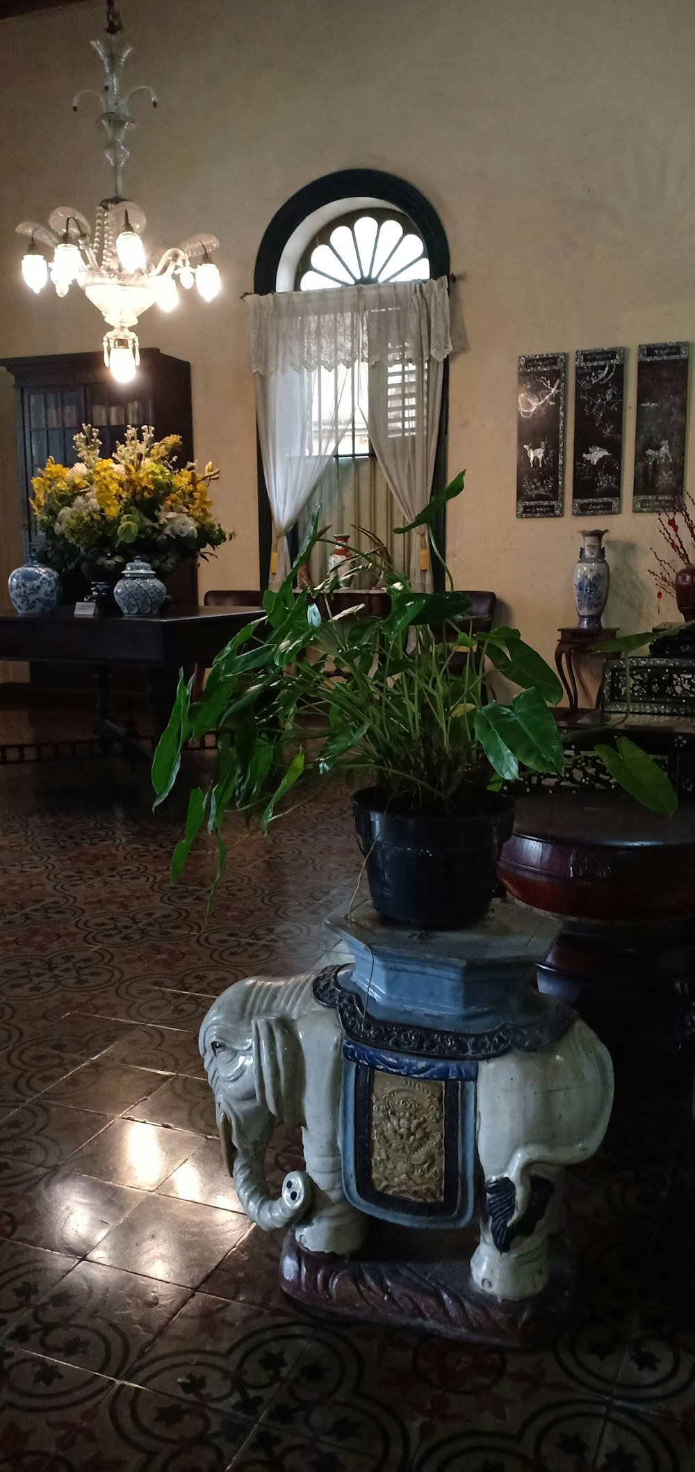 a vase of flowers sits on a table