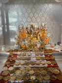 Devotees participating in the three-day Narayan Nagbali puja, surrounded by sacred offerings and vibrant decorations.