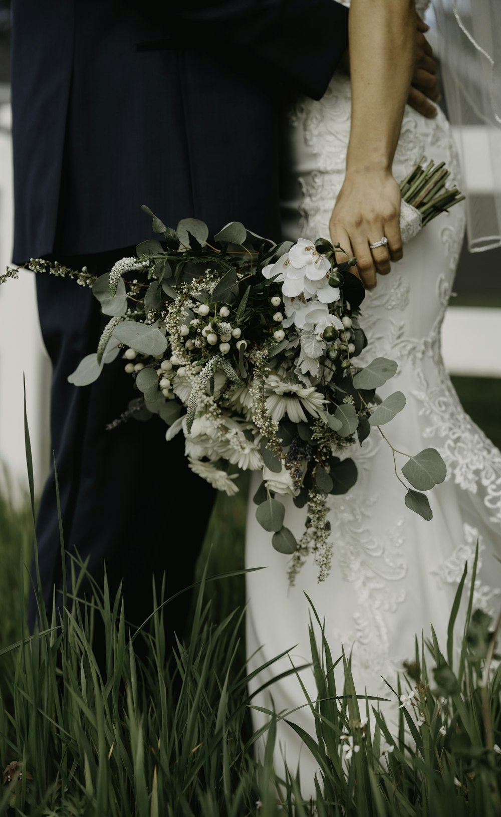 a person holding a bouquet of flowers