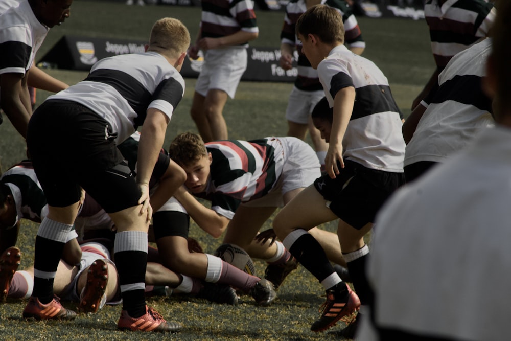 a group of men playing rugby