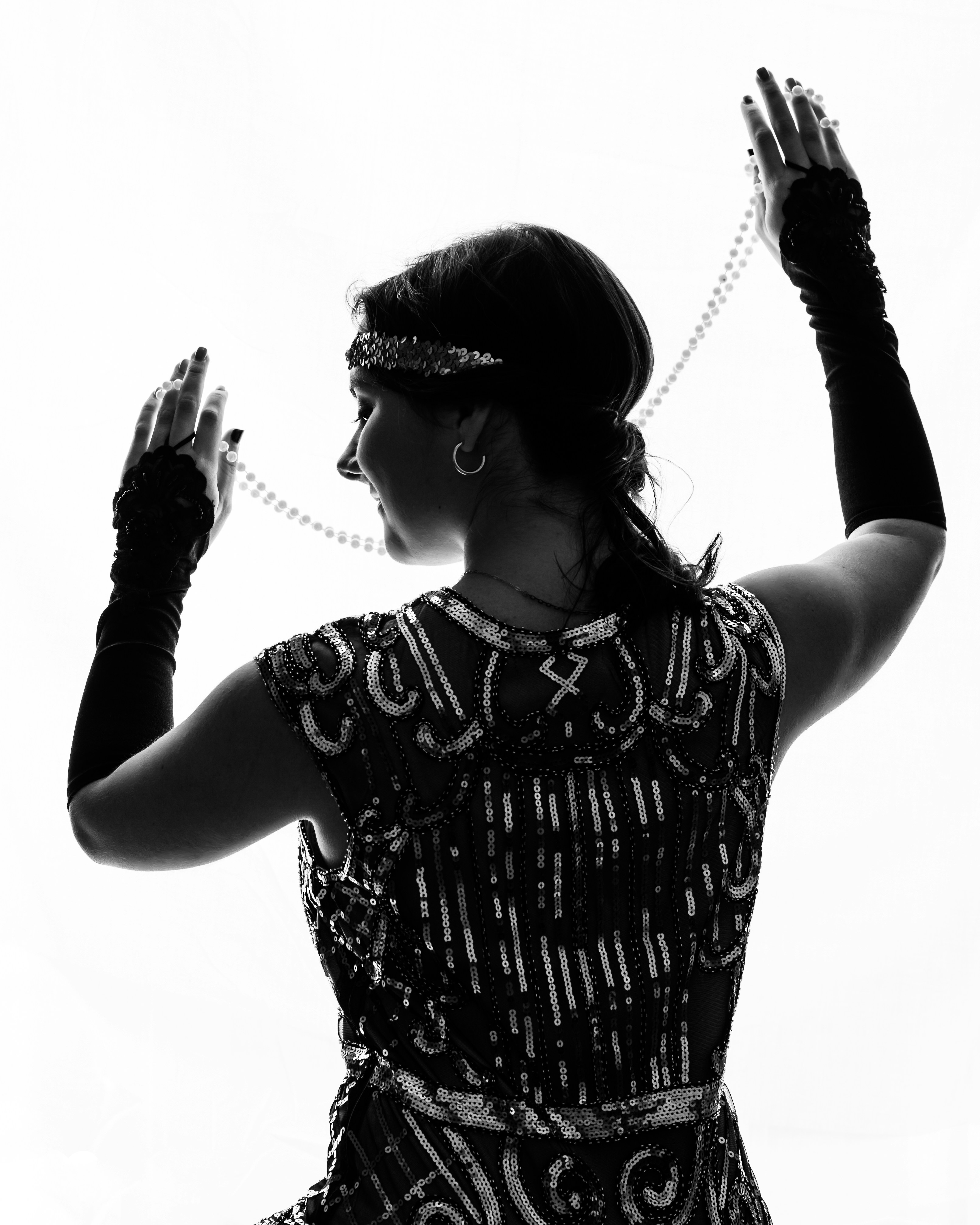 a woman with her hands up