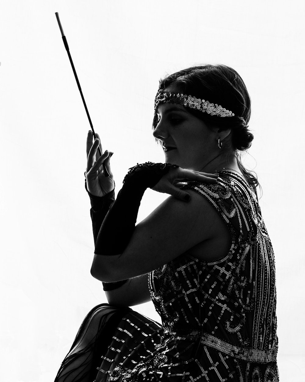 a woman holding a bow and arrow