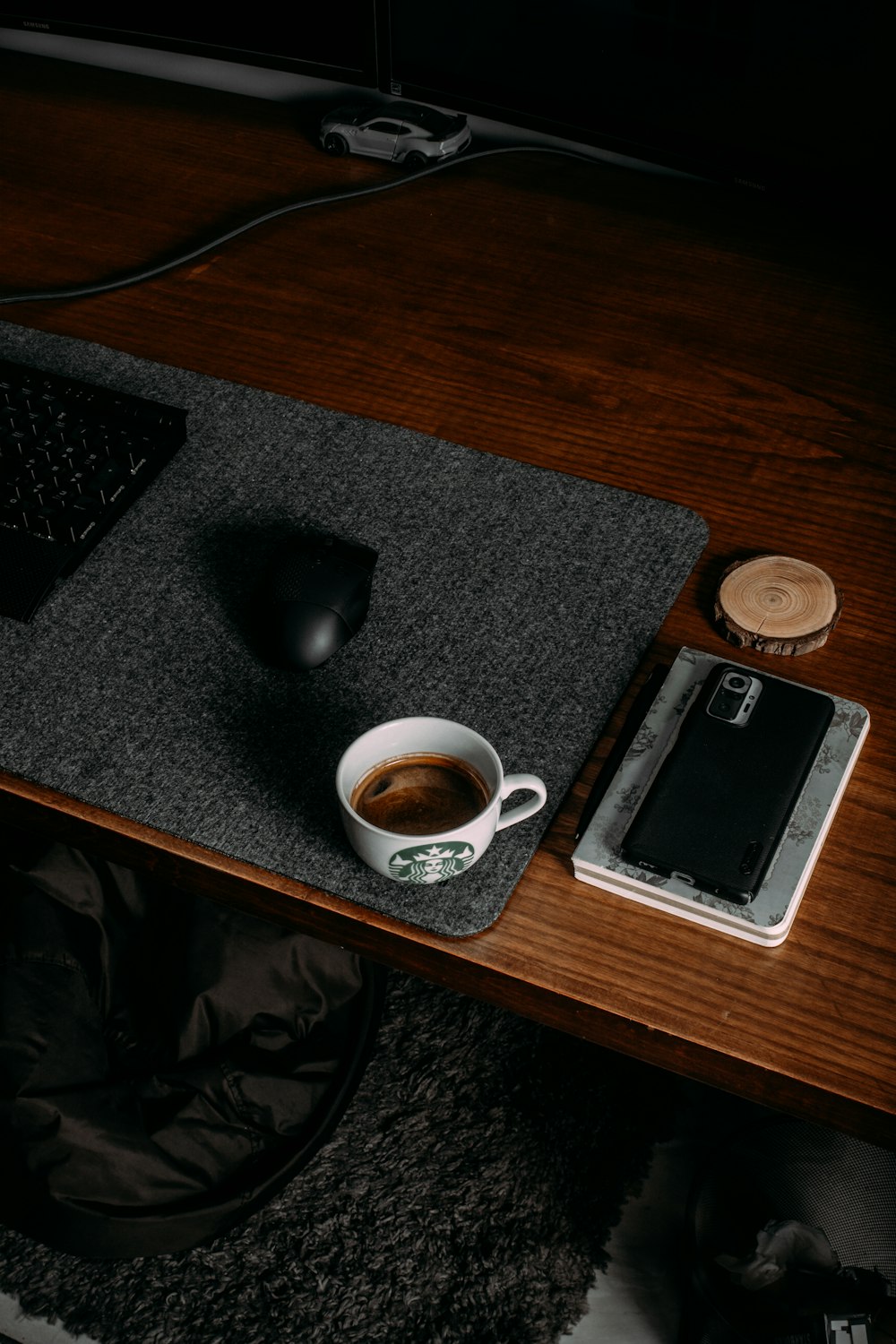 a cup of coffee on a desk