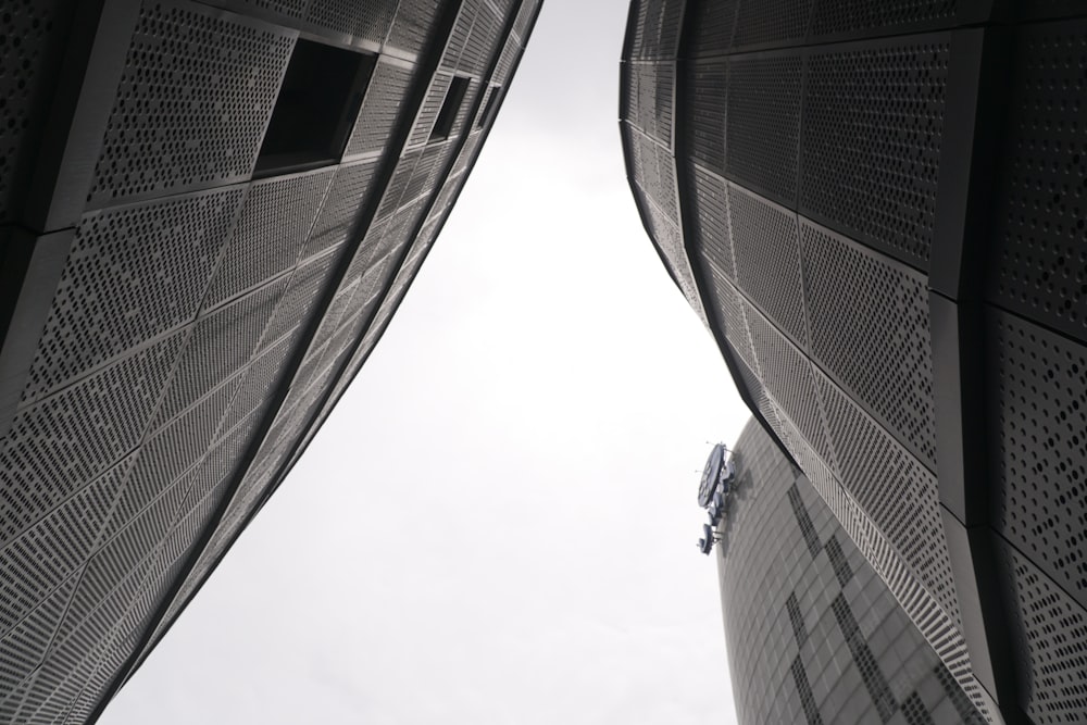 a person walking between tall buildings