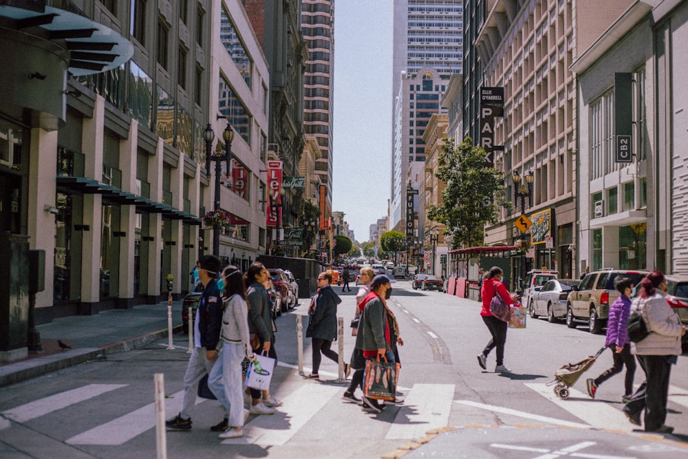 people crossing a street