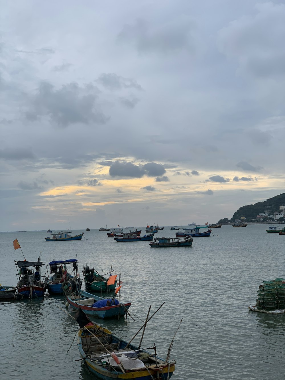 a group of boats in a harbor