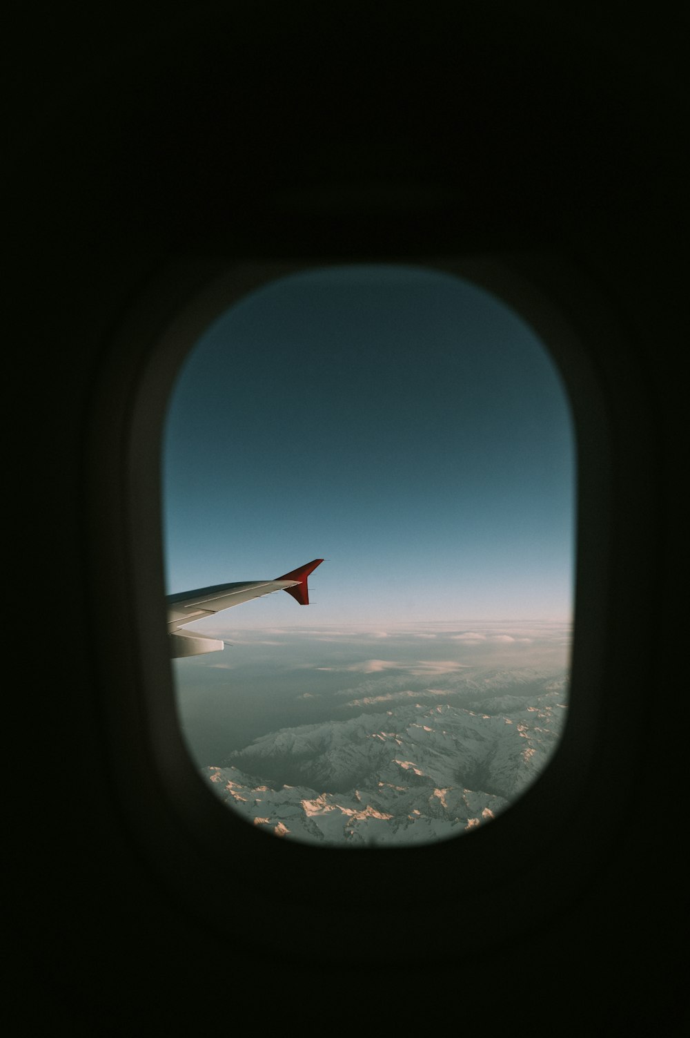 an airplane flying over a city