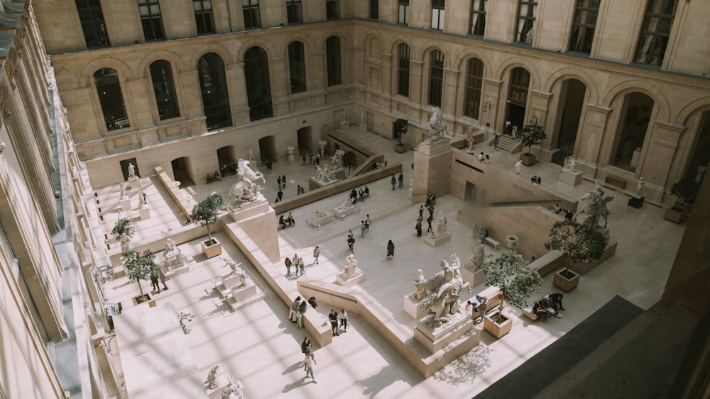 a large building with many arches and statues