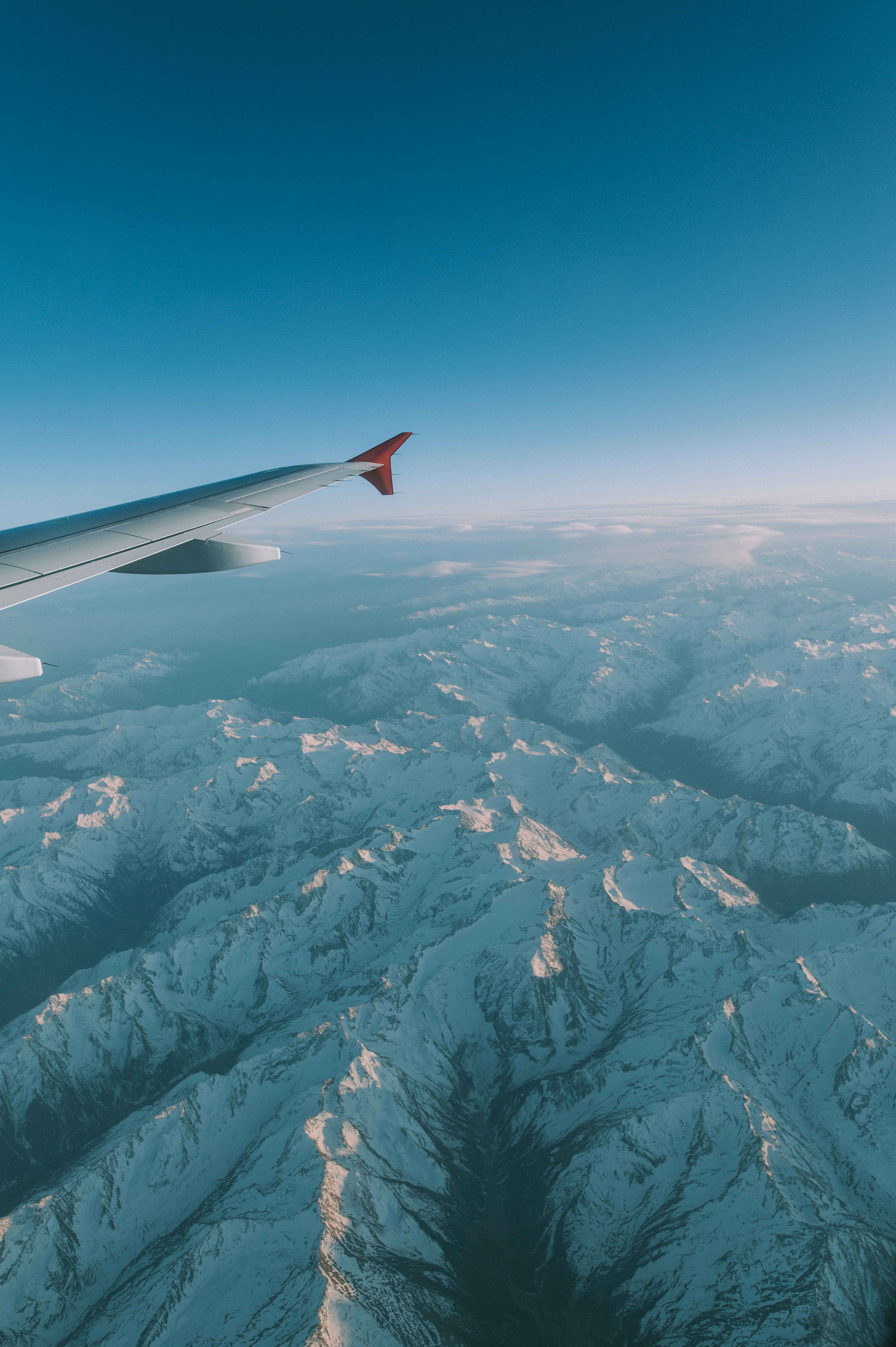 an airplane wing in the sky