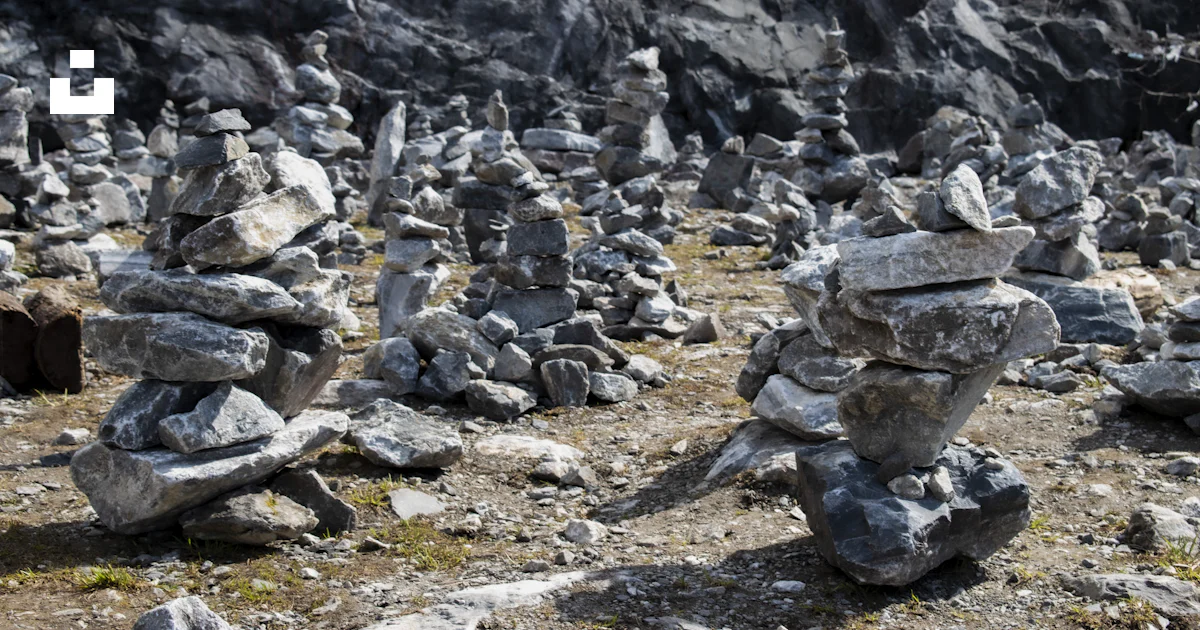 A rocky area with a few rocks photo – Free Grey Image on Unsplash