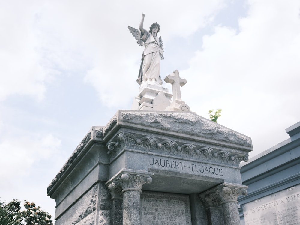 a statue on top of a building