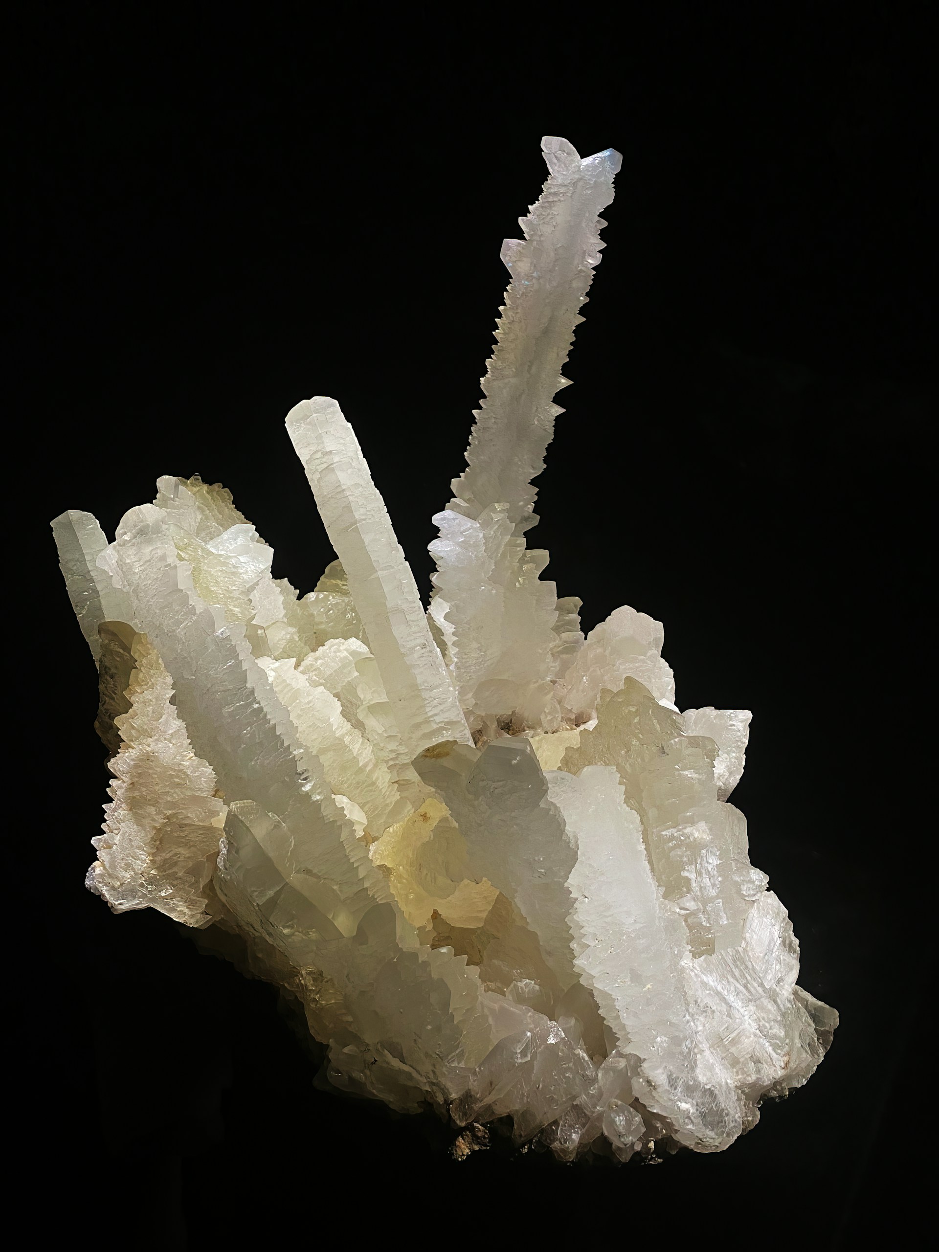 a white crystal with a black background