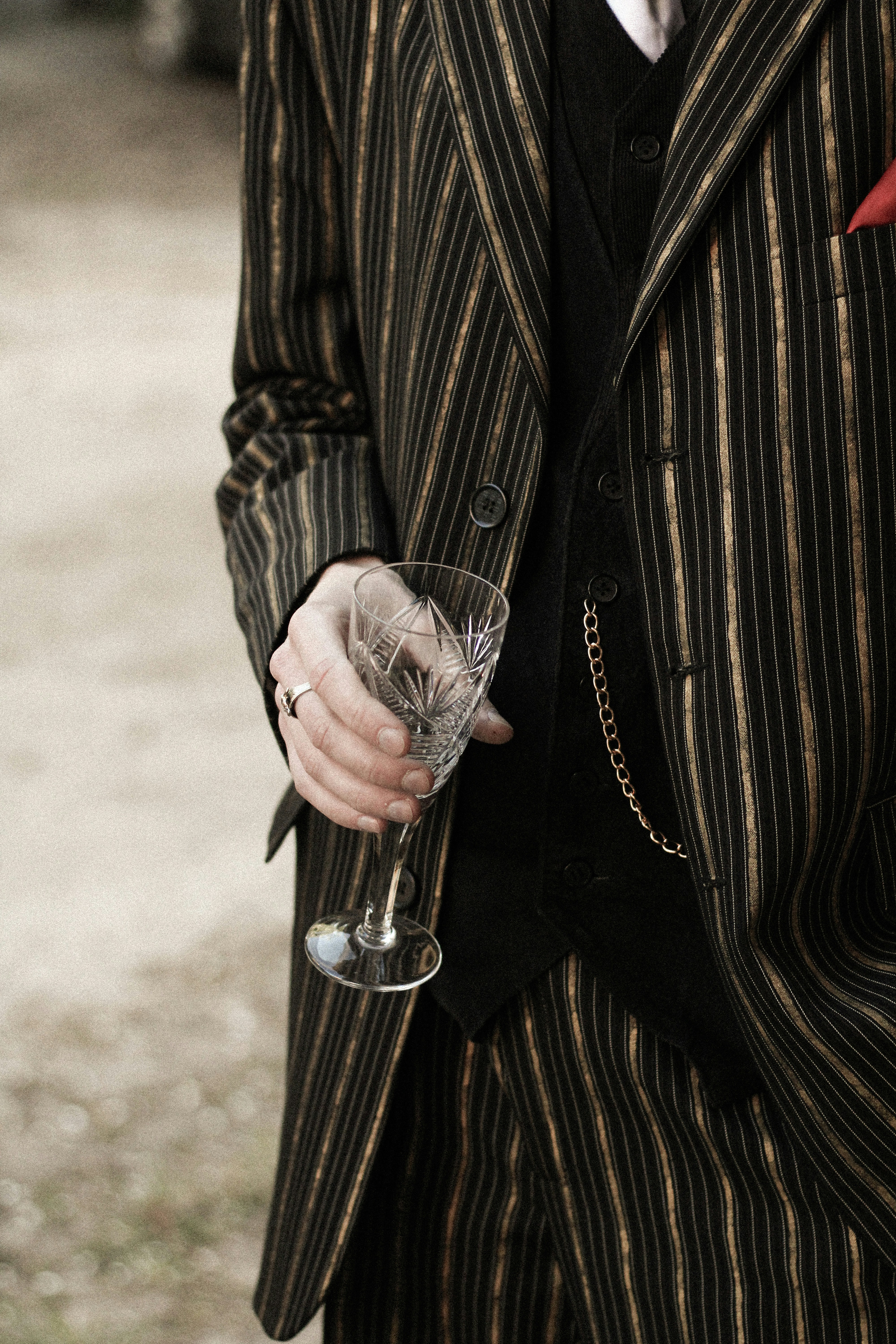 a person holding a glass