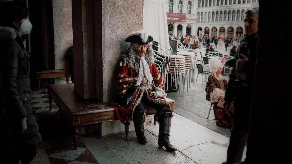 a person sitting on a bench