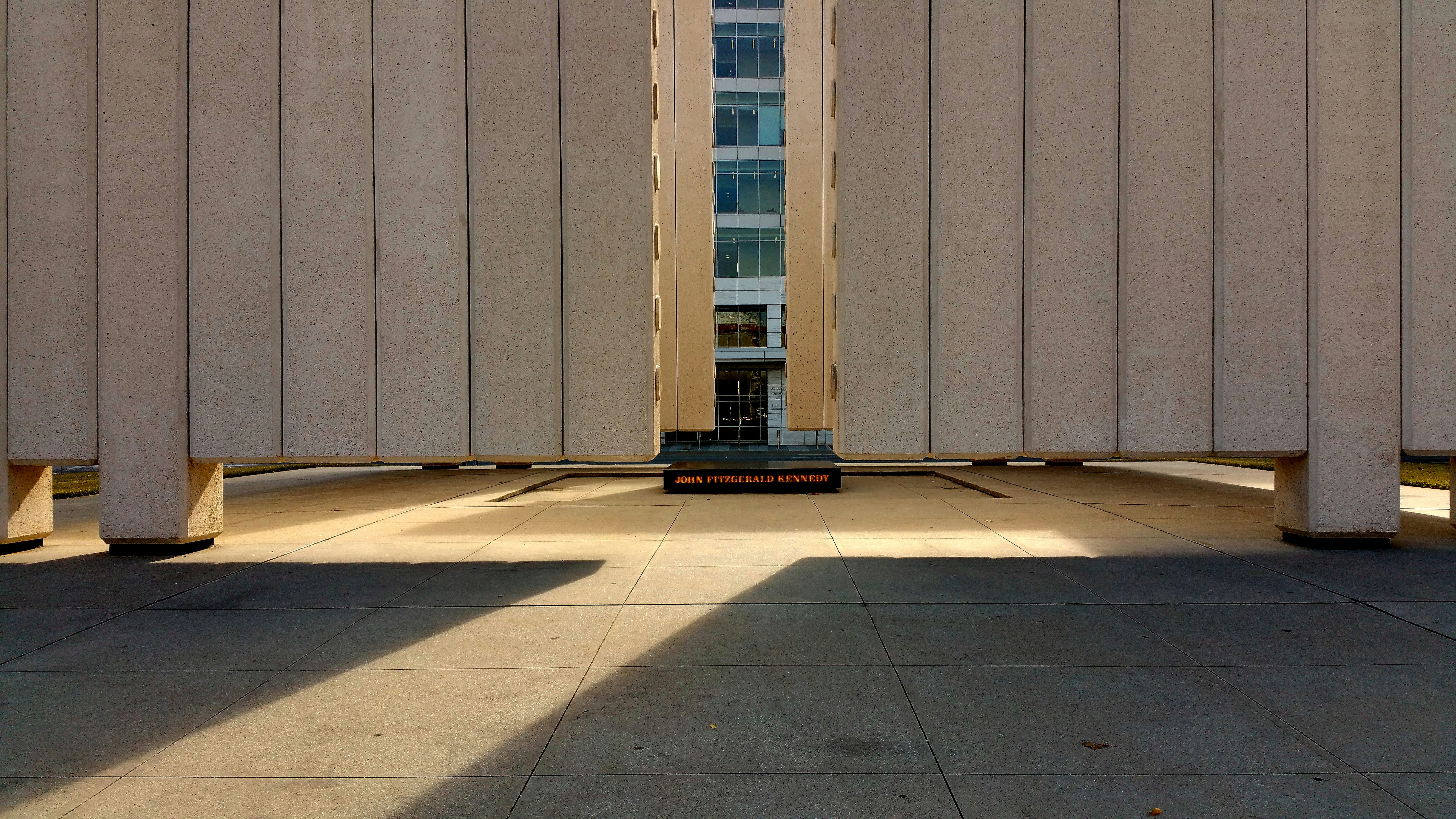 a concrete building with a window, JFK Memorial in Downtown Dallas, Texas
