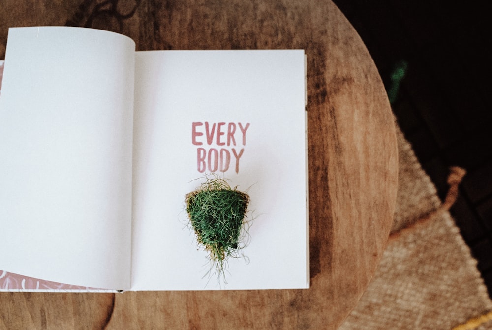a book with a plant in it