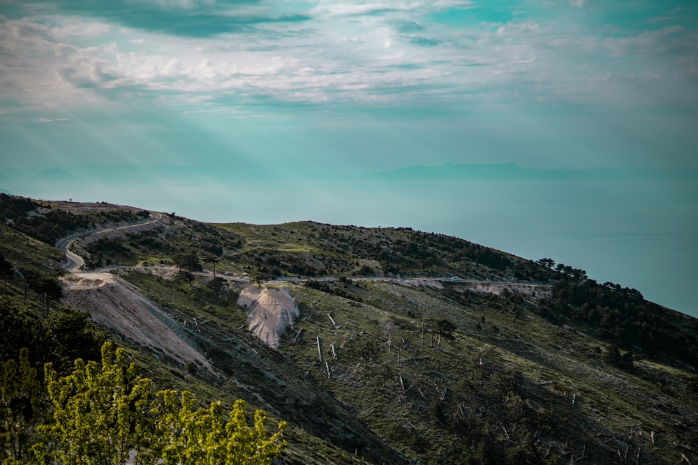 a landscape with hills and trees