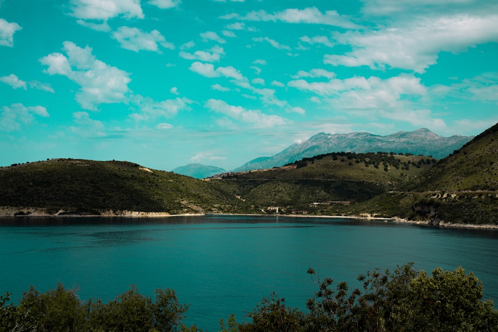 a lake surrounded by hills