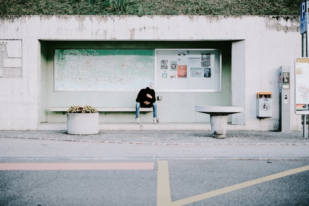 a person sitting on a bench