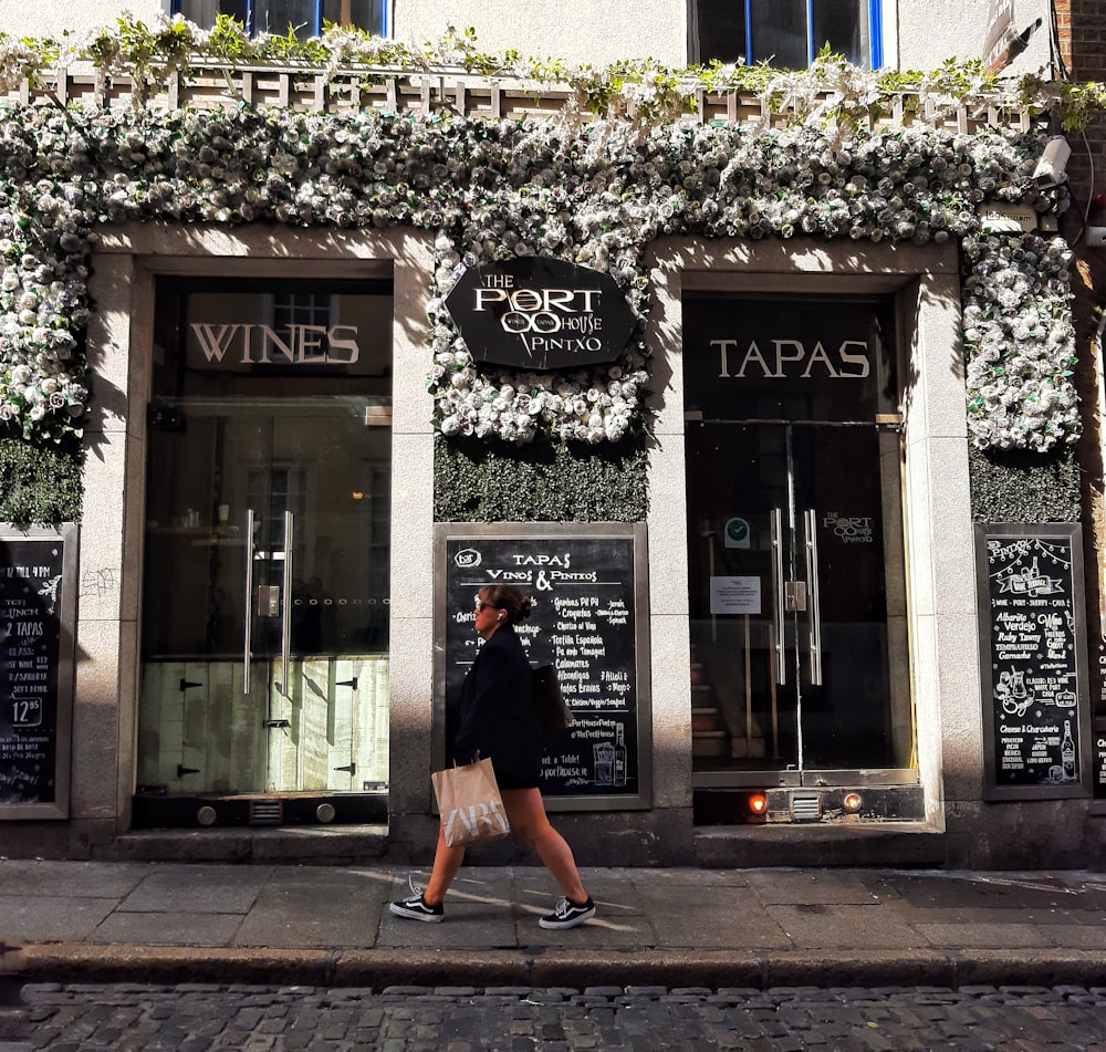 a person walking on the sidewalk