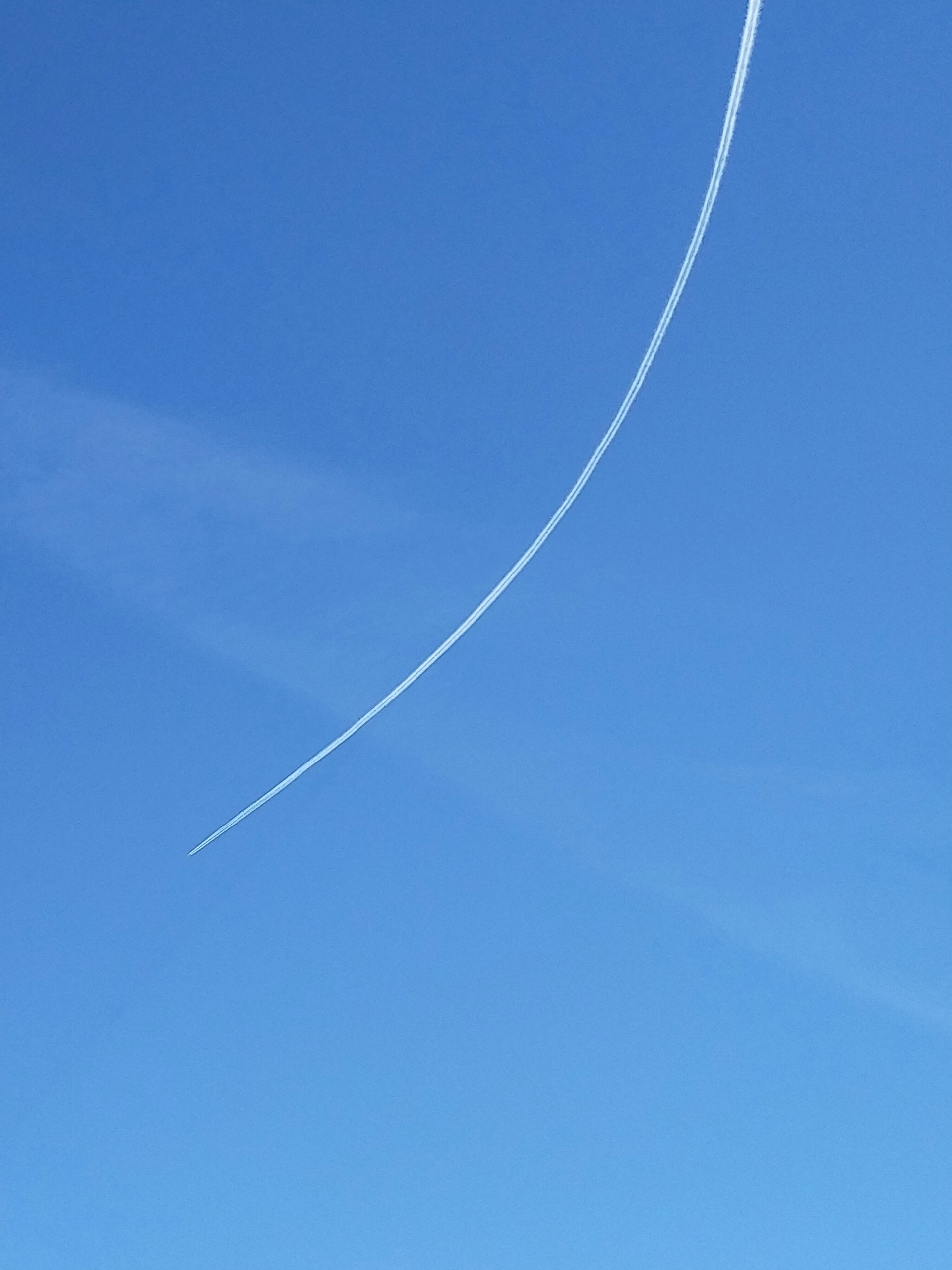 a jet leaving a trail of smoke