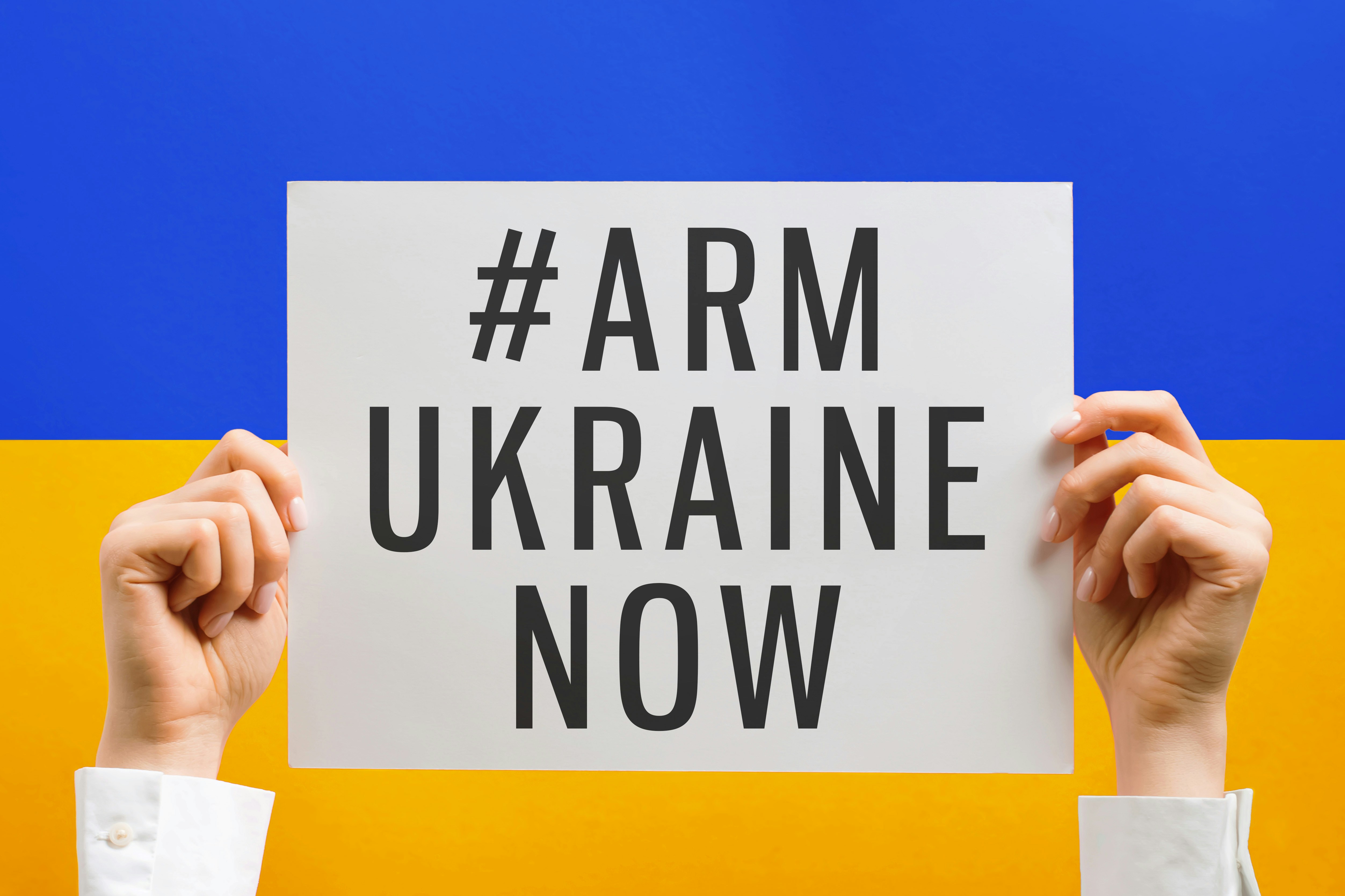 a person holding a sign