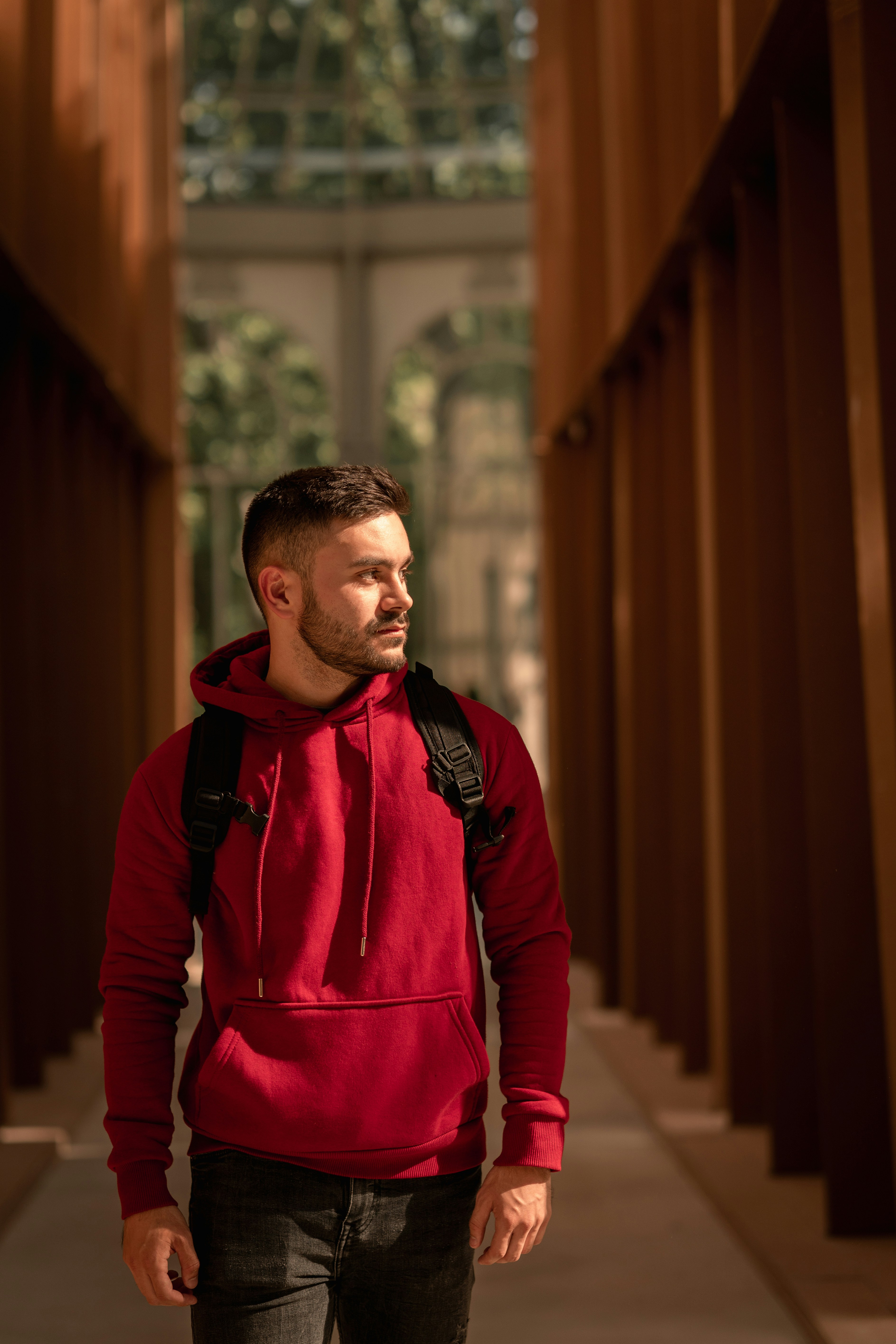 A person wearing a red jacket photo – Free Palacio de cristal Image on ...