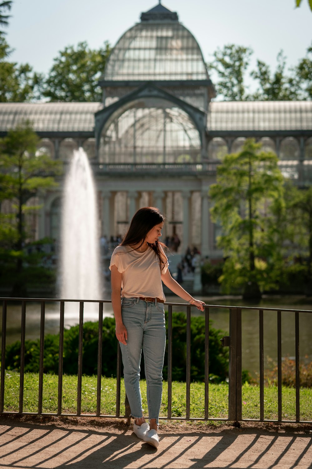 a person standing on a fence