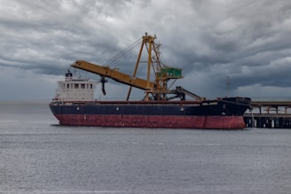 a large ship with cranes on it