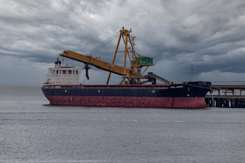 a large ship with cranes on it