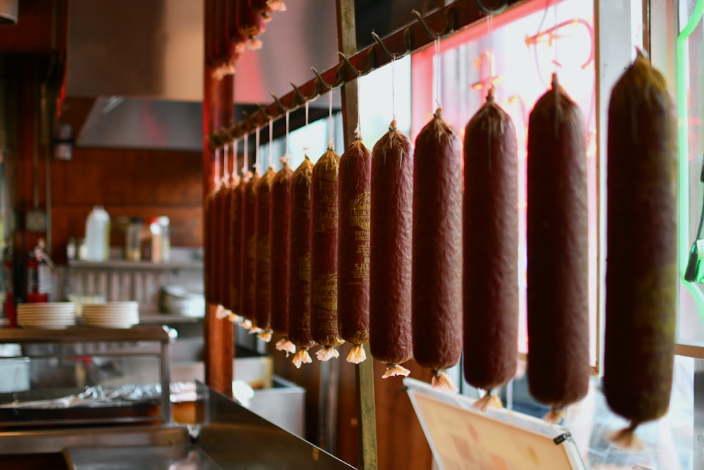 a row of sausages on a rack