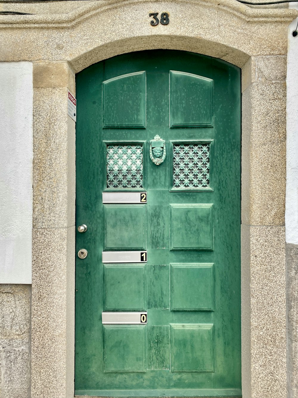 a green door with a window