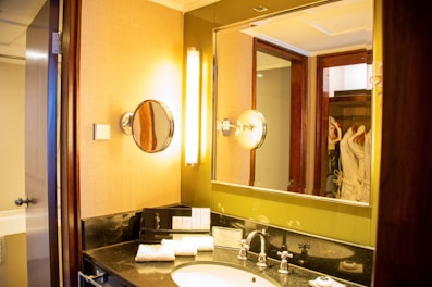 a bathroom with a large mirror