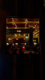 Guests enjoying a warmly lit restaurant atmosphere blending tradition and elegance.
