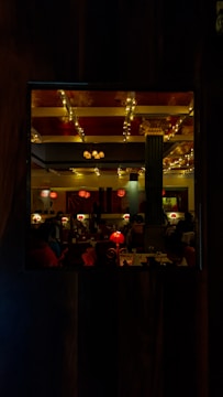 A cozy restaurant interior with elegant lighting and decor.