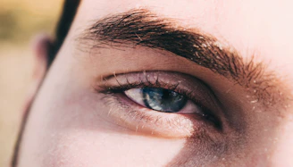Close-up of soft natural eyelash extensions enhancing a woman's eyes