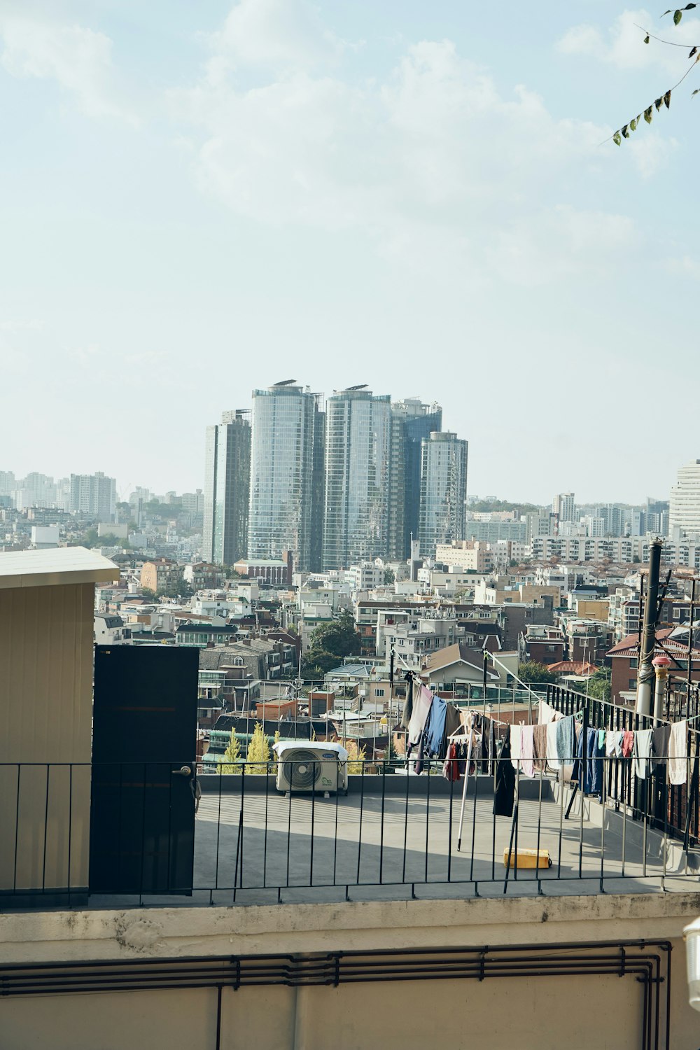 a city skyline with a bus and cars