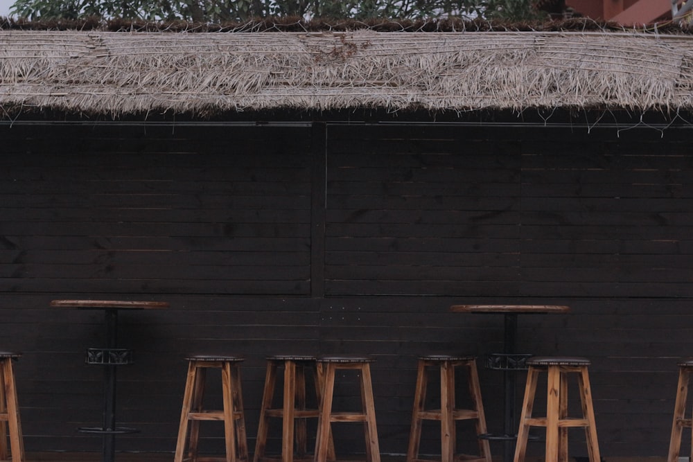 a group of stools in front of a building