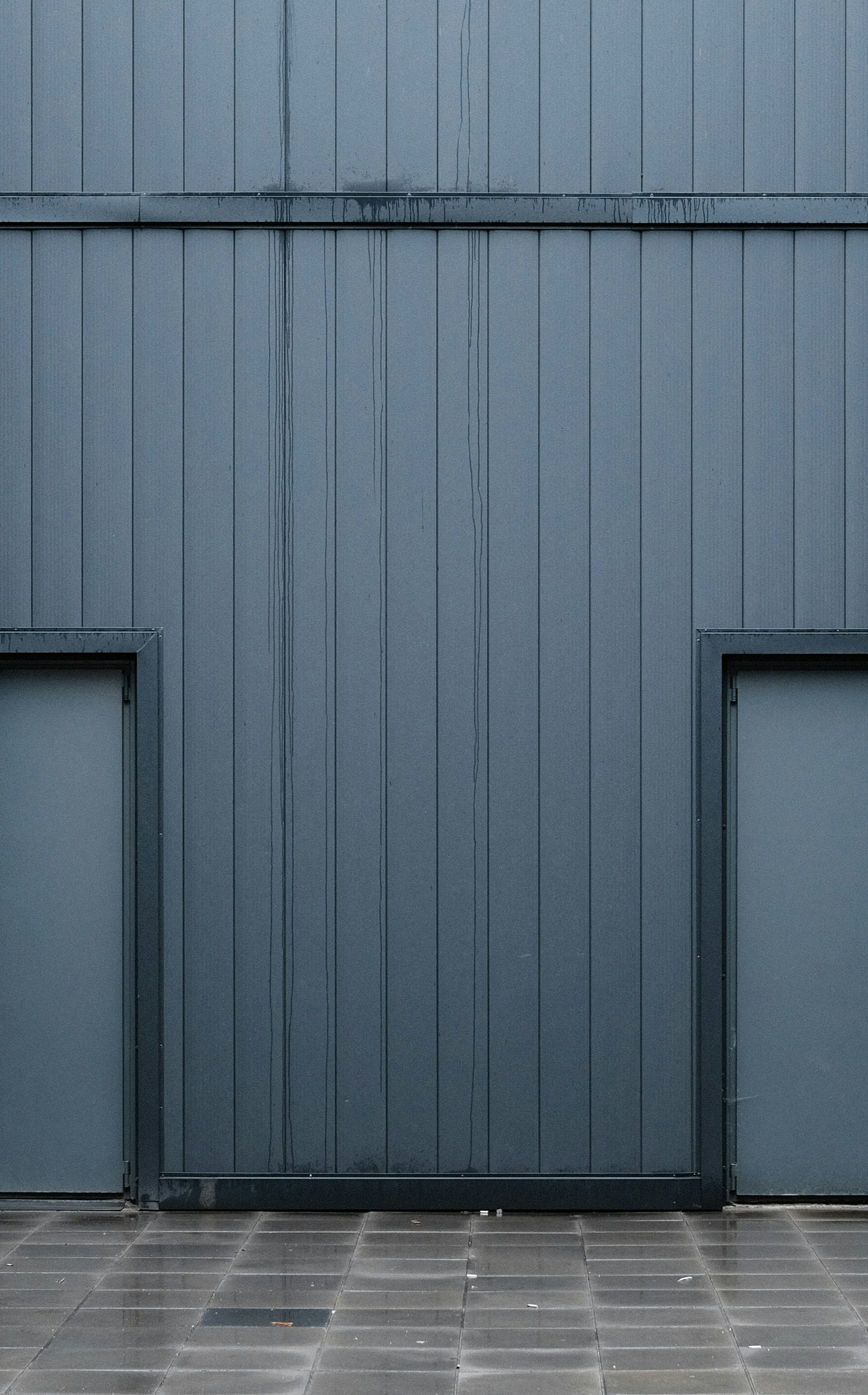 a grey metal wall