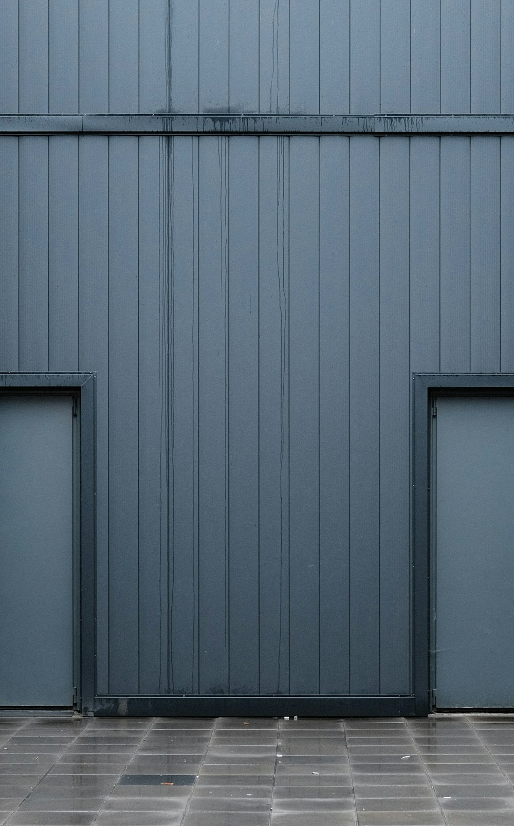 a grey metal wall