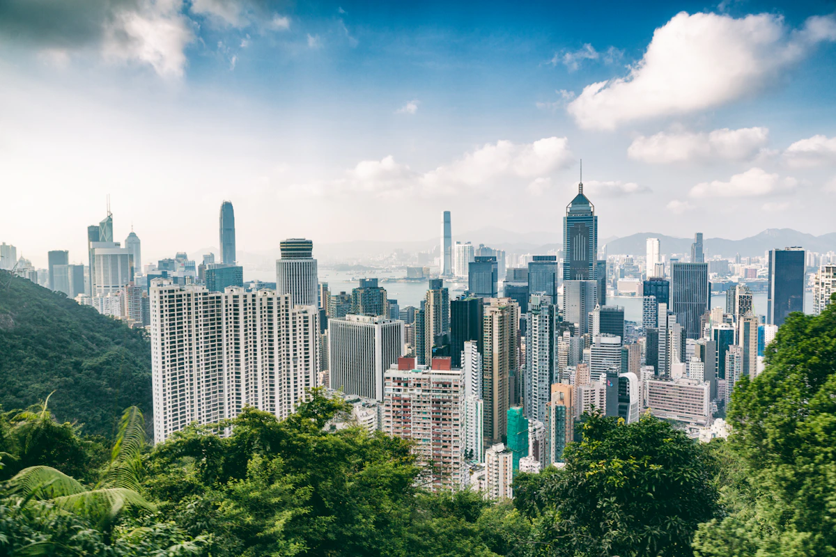 Victoria Peak Hong Kong with city skyline and tall buildings below