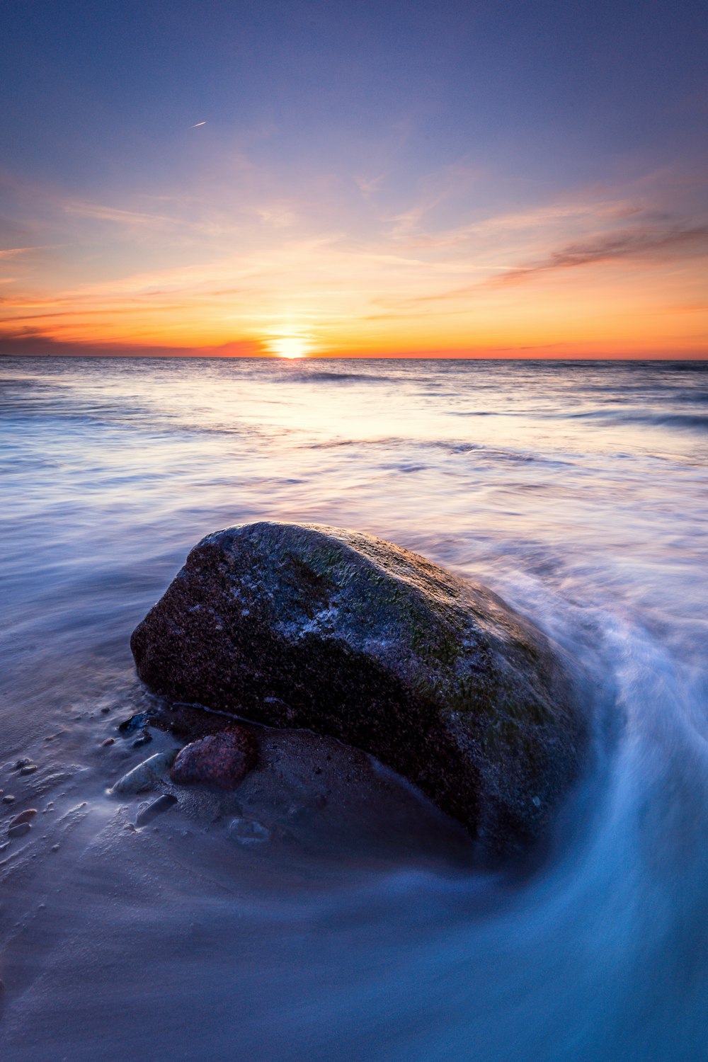 a rock in the water