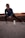 a person kneeling on the ground